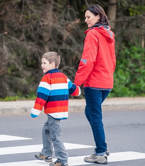 mother and son crossing